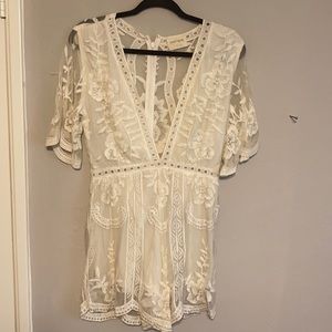 Lace lined white romper